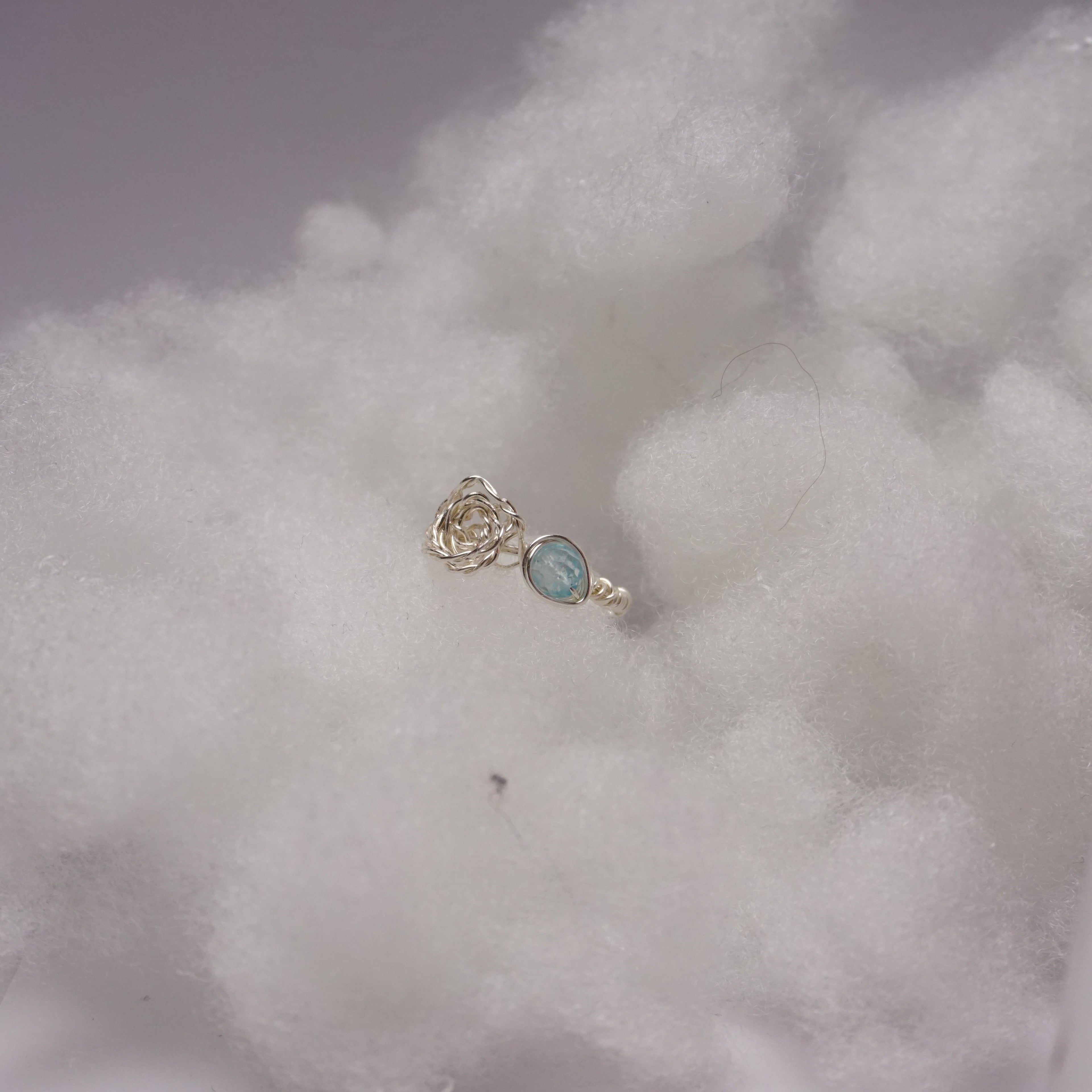 Pierścionek ,,ROSA'' Topaz niebieski