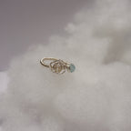 Pierścionek ,,ROSA'' Topaz niebieski